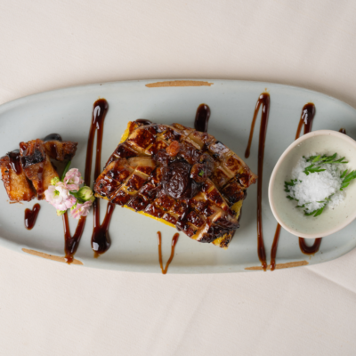 Seared Hudson Valley Foie Gras, Toasted brioche, citrus glazed pork belly, port wine reduction, apple-pear chutney, Peruvian sweetie drop peppers